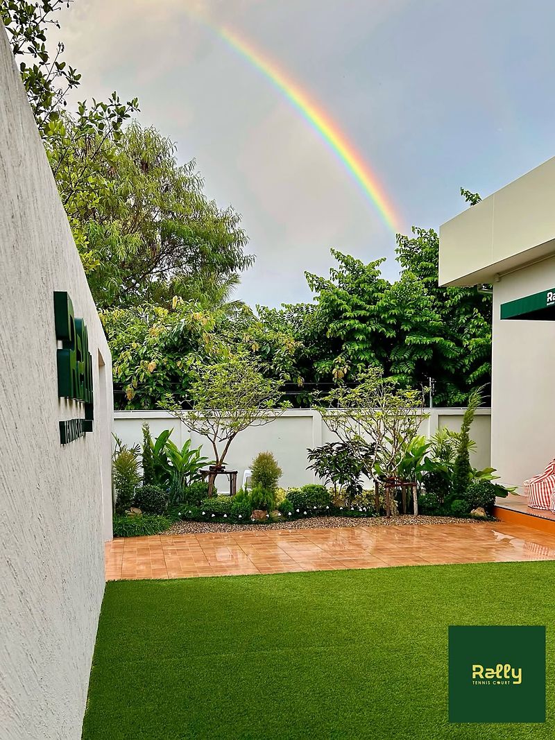 Rainbow over the garden at Rally Tennis Court
